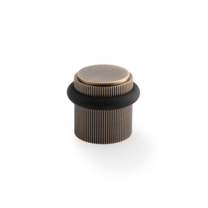 Brunel Floor Reeded | Dørstopper i Antik Messing